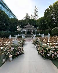 Our wedding day was a dream come true in the stunning Rose Court Garden at  the Disneyland Hotel. One of my favorite memories is walking down the aisle  to “I See the