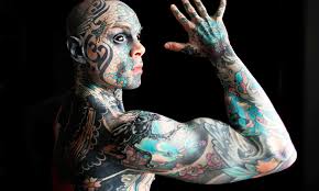 These tattoos use several elements to create a permanent memorial to the wearer's two children. Head To Toe Tattooed Teacher Loses Kindergarten Job After Giving Child Nightmares Gulftoday