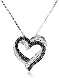 Black And White Diamond Intertwining Infinity Necklace Earrings And Bracelet Intertwining Hearts Accented In Black And White Diamond Stones Deliver Eye Catching Sparkle On This Heart Black Diamond Jewelry Black Diamond Necklace Jewelry