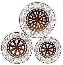 Bring a touch of shimmer to your space with this sleek wall art. Bronze Aztec Metal Wall Art 3 Piece Set Industrial Metal Wall Art By Stylecraft Home Collection Houzz