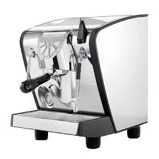 It shares two tables, one is the nzd currency converts to the major currencies; Nuova Simonelli Musica Coffee Machine