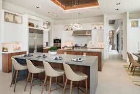 Double island kitchens benefit from work zones that define the layout so it works best for food preparation and entertaining. 5 Double Island Kitchen Ideas For Your Custom Home