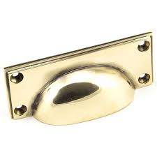 Classic in design and finish, the art deco handle range is beautifully crafted and can be used in a wide range of places to give the feel of. Anvil 45400 Aged Brass Art Deco Drawer Pull 100mm X 42mm Brass Cabinet Cup Pulls