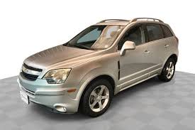 Image result for Silver Topaz 2013 Captiva