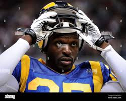 St. Louis Rams defensive back Marcus Roberson (47) is run down by Seattle  Seahawks wide receiver Kevin Norwood after intercepting a Russell Wilson  pass during the second quarter at CenturyLink Field in