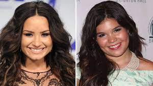 Demi lovato and her sister madison de la garza in 2011. Demi Lovato Was Banned From Seeing Her Sister Until She Got Sober Teen Vogue