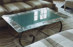 There are 12362 etched glass decor for sale on etsy, and they cost $33.69 on average. Glasszoo Cast Glass Table