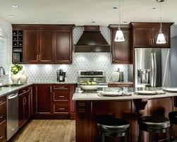 If you want to enhance the warm and inviting red undertones of your cherry cabinets, choose a neutral color for your walls. Kitchen Colors With Cherry Cabinets Homifind