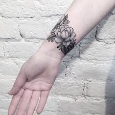 Of course it can help you get rid of the regret but still its hard to decide and actually go to a tattoo shop down the road. The Ultimate List Of 50 Awesome Wrist Tattoos For Women Cuff Tattoo Wrist Tattoos For Guys Wrist Tattoos For Women