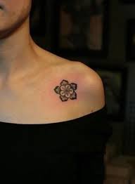 Flower Tattoo On The Chest Shoulder Front Shoulder Tattoos Tattoos Small Shoulder Tattoos
