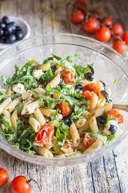 A Delicious Summer Greek Pasta Salad Full Of Feta Cheese Olives And Roasted Tomatoes And Tossed With A Greek Pasta Salad Recipe Greek Salad Pasta Greek Pasta