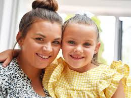 Banstead girl who suffered years of painful infections now 'really well'  after having kidney removed