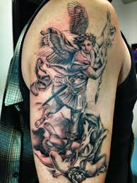 Michael the archangel is an amazing tattoo to get for those who are into christianity. St Michael Angel Tattoo Tattoos Archangel Tattoo
