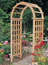This classic garden arch has just six parts and can be built in less than a day. Arboria Victoria Arbor Arch Garden Arbor Diy Garden Trellis Garden Archway Garden Arch