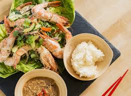 In a large bowl, add shrimp, herbs, and vegetables and drizzle sauce over. Spicy Thai Shrimp Salad Andrew Zimmern