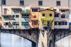 The ponte vecchio was designed by a student of giotto, taddeo gaddi and was finished in 1345. A Brief History Of Ponte Vecchio The Old Bridge In Florence