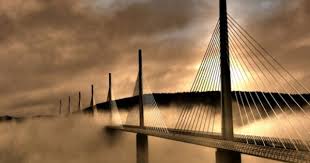 Millau Viaduct Millau France Spanning 1 6 Miles And Reaching A Height Of 1 132 Feet The Viaduct Was Op Vacation France France Infrastructure Architecture