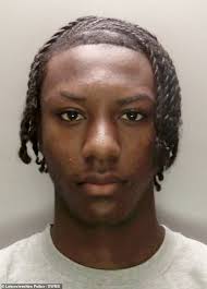 Moment hooded killer runs across road and stabs father, 50, in the neck  with a knife before fleeing scene