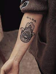 Then my favourite is this tiny hidden tattoo, which is for my cat marvin that i wrote a long answer about in a previous post. Hamsa Tattoo It Will Protect You From Evil Eye 25 Good Luck Tattoo Symbols With Meaning Behind Them Good Luc Gluck Tattoo Tattoo Symbole Tatowierungen