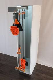 How to store brooms and mops. Sliding Home Organizers For Mops And Brooms Space Saving Storage Solutions