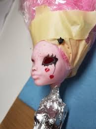 What should I do with her hair and face to turn her into a dark angel?