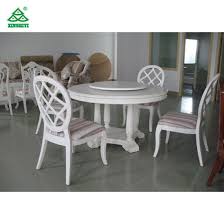 How many chairs are in a round table set? China Hotel Elegant Wooden Luxury Dining Room Furniture White Round Dining Table China Dining Table White Round Dining Table