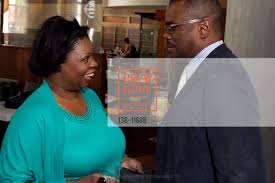 Crystal Odum Ford with Michael Johnson