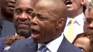 This is not a city where you use idealism to state you're giving everything  to everyone for free. So this is not a city of handouts,' said New York  City Mayor Eric