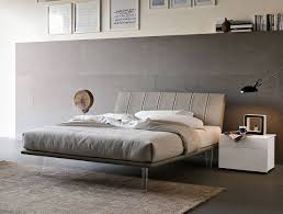 La luminosità delle finiture, il calore delle venature, la lucentezza preziosa delle superfici laccate. Seven Gruppo Tomasella Letti Imbottiti Idee Letto Mobili Italiani