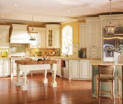 In ancient egypt, linen was looked upon as a symbol of light and purity, as well as wealth. Melbourne Off White Cabinets In Oyster Finish With Caramel Glaze In A Traditional Ki Kitchen Design Gallery Traditional Kitchen Cabinets Kitchen Cabinets Decor