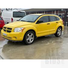 Image result for Solar Yellow 2007 Caliber