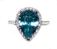 Pin By Popular Rings On Most Beautiful Rings Blue Zircon Pear Diamond Rings Zircon Jewelry