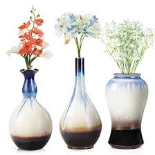 This room is equipped with fancy gadgets, swanky furniture pieces and a great paint scheme. Unique Glazed Design Decorative Modern Floral Vase For Home Decor Living Room Centerpieces And Events Ceramic Flower Vases Set Of 3 Vases Home Kitchen Fcteutonia05 De