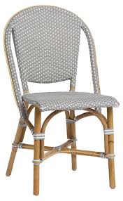A Modern Interpretation Of A Classic Parisian Bistro Chair This Eye Catching Piece Is Handcrafted Of Rattan And Woven Chair Side Chairs Parisian Bistro Chairs