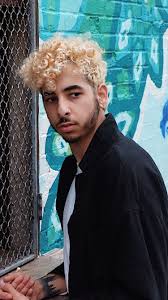 Men S Curly Hair Dyed Blonde Dyed Curly Hair Dyed Blonde Hair Curly Hair Styles