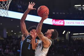 He played college basketball for one year with the liberty flames before transferring to the duke blue devils.he is the son of former nba player dell curry and the younger brother of nba player stephen curry Nba 2020 Draft Carey Goes At 32 Seth Curry Traded Duke Basketball Report