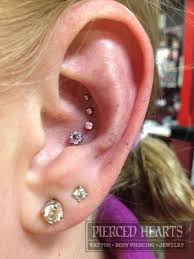 My aunt took me to claire's at the mall, where i browsed a display of birthstone earrings, picked out a sparkly there's actually a growing movement of piercers advocating for parents to pierce their kids' ears (or other parts) at tattoo shops instead of the mall. Pin By Em L On Piercings Body Jewelry Body Mods Ear Piercings Tragus Ear Piercings Tragus Earrings