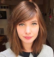 Medium Razored Haircut With Side Bangs Side Bangs Hairstyles Haircut For Big Forehead Bangs With Medium Hair