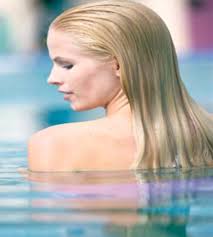 What should I look for to prevent green hair in pool?