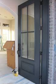 Dark gray front door sophisticated and timeless, dark gray makes an excellent front door color for more traditional house styles. Pin By Kim English On For The Home House Design House Colors Updating House