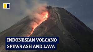 Indonesian volcano Mount Merapi erupts, forcing tourists to flee clouds of ash - YouTube