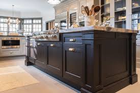 Has anyone done anything they love with 9 ft. Custom Wood Stained Kitchen Island With Satin Brass Cabinet Hardware Custom Wood Kitchen Cabinets Kitchen Range Hood Kitchen Cabinet Design