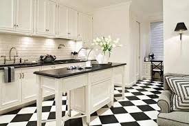 The white kitchen island made of a black quartz countertop is functional and provides a dining and work. Pin On Decor Kitchen