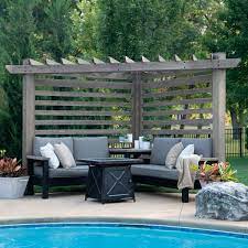 This wooden pergola kit has a 12 ft. Backyard Discovery Catalina Cabana Pergola With Conversation Seating Overstock 31609362