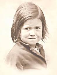 This is my mum, she is now 81 years old, her hair is the same colour as  mine, but she has brown eyes, she has ginger hair