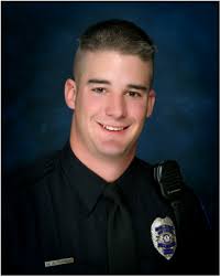 Littleton Police Cpl. Jeff Farmer receives Medal of Valor from President  Joe Biden