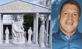 Big Willy Collins' headstone made from solid white marble and features a  solar-powered jukebox