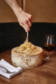 Pasta In Gigantic Wheels Of Cheese And Pretty Interiors Gloria Is London S Must Visit Restaurant In 2020 Cheese Wheel Pasta Cheese Wheel Restaurant