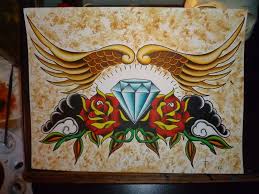 Diamond tattoos can symbolize many things, and each person who incorporates a diamond into their body art will have to figure out how they want to interpret it. Traditional Diamond With Roses And Wings Tattoo Design