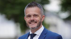 Stormont: Robbie Butler is the new health minister - BBC News
